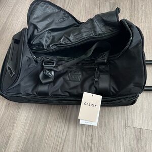 Calpak Stevyn 22" Rolling Duffel Bag- Black